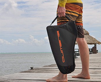 Subwing Bag being carried by a man on a dock.